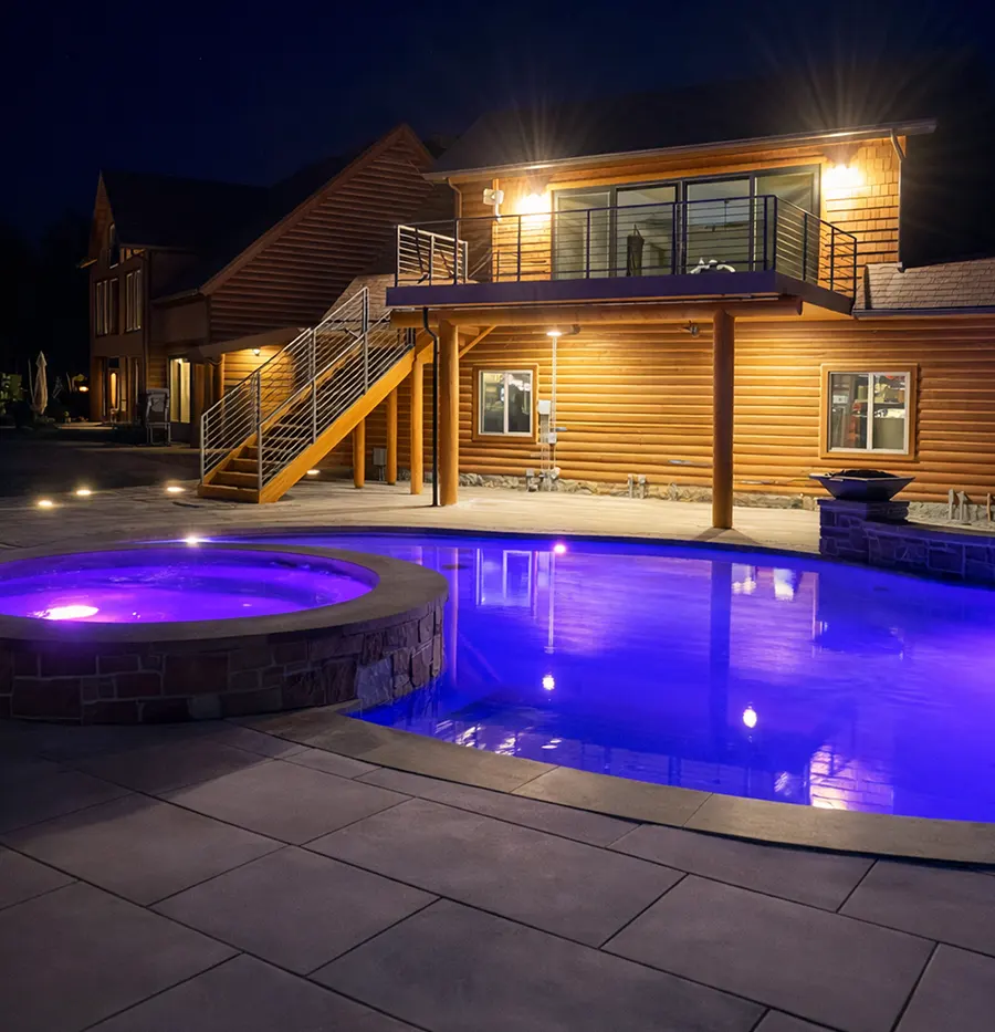 exterior lit patio, custom deck and pool